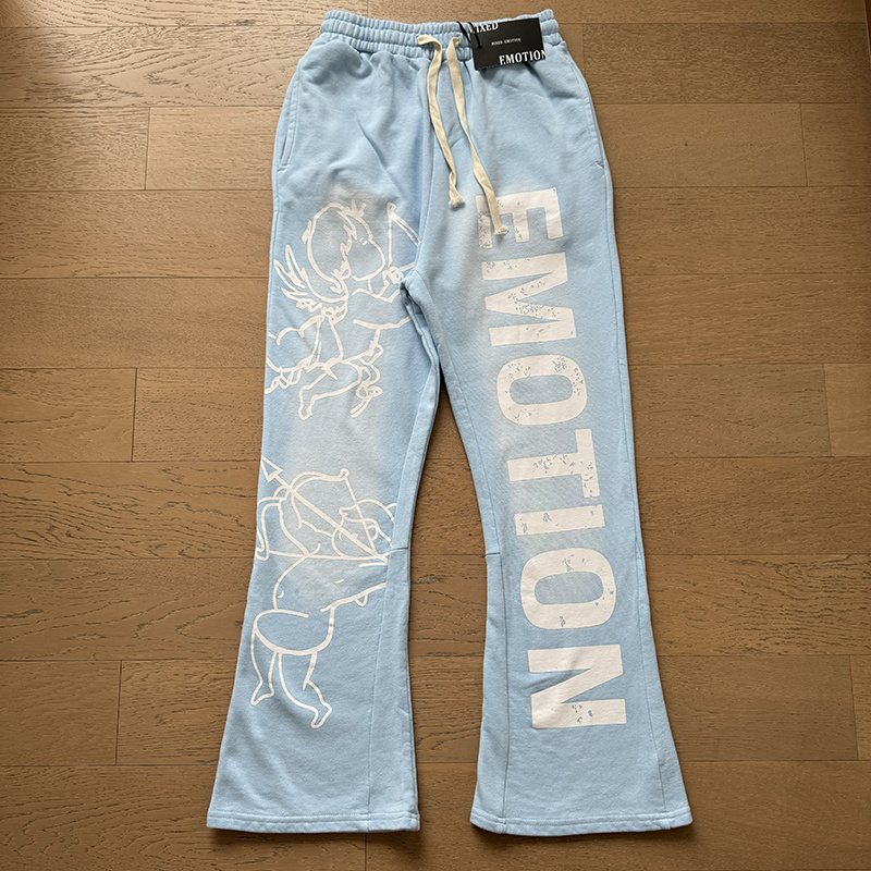 MIXED EMOTION Washed Graphic Flared Pants — front