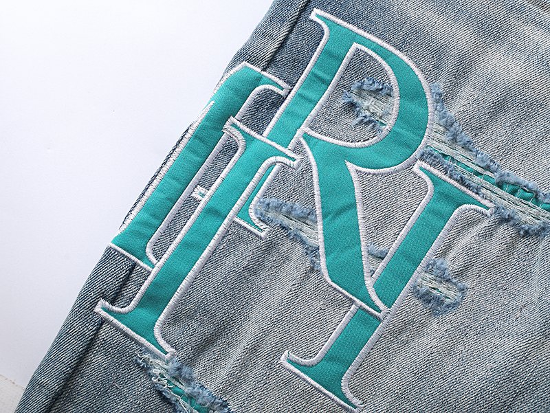 AMIRI Turquoise Embroidered Light Blue Jeans — detail