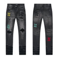 AMIRI Black Distressed Embroidered Jeans — hero