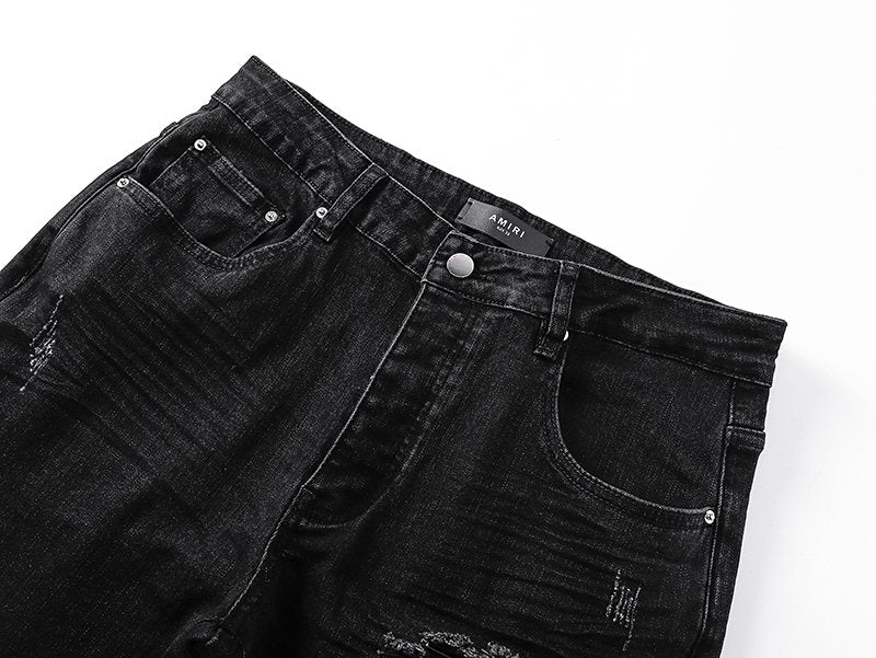 AMIRI Black Distressed Ribbed Knee Jeans — detail